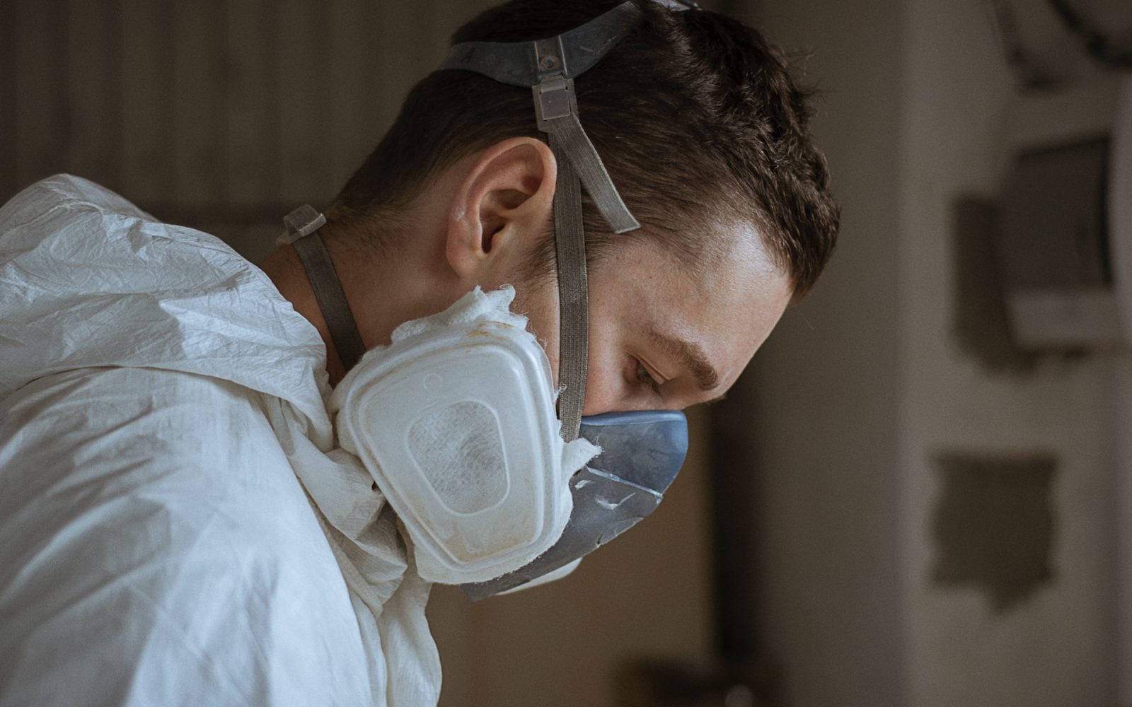 Man wearing PPE breathing equipment